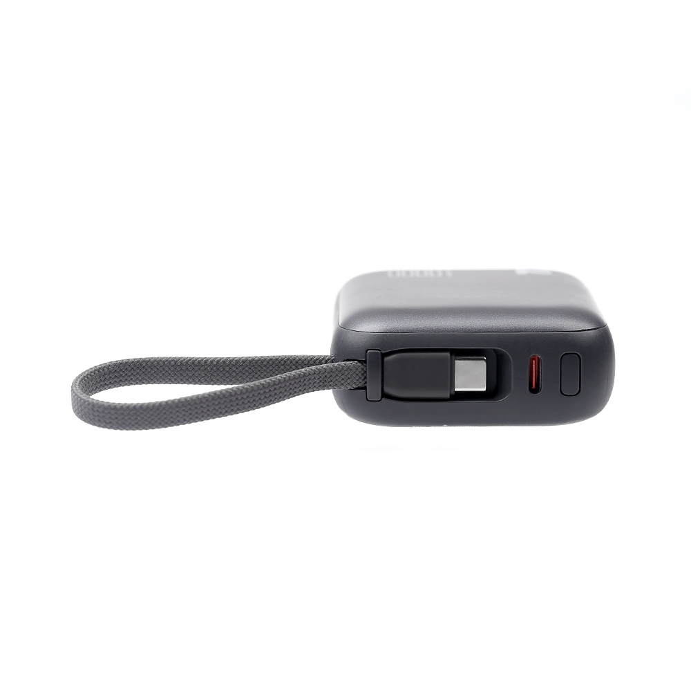 NCC built-in cable power bank charging smartphone and earbuds simultaneously